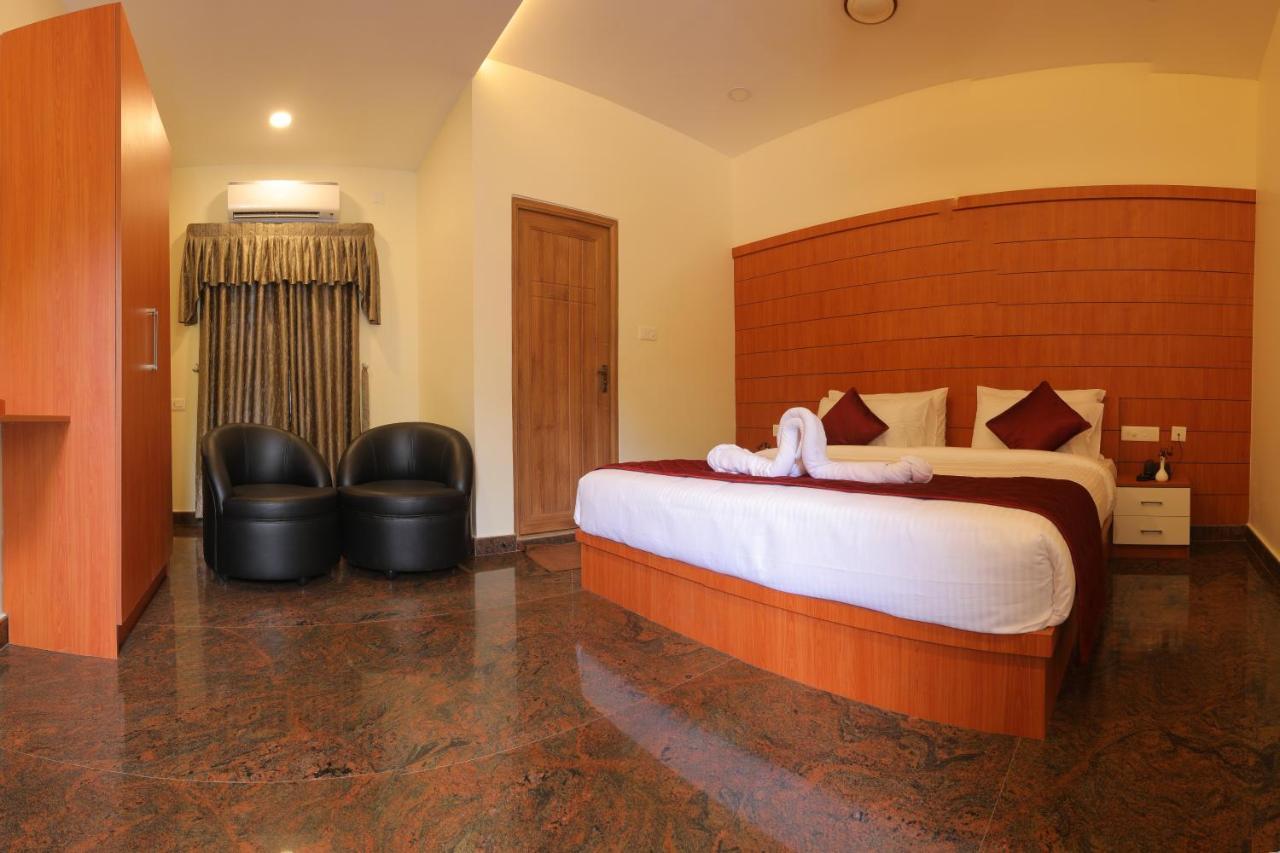 Thenmala Hormuz Inn Kolattupuzha Buitenkant foto