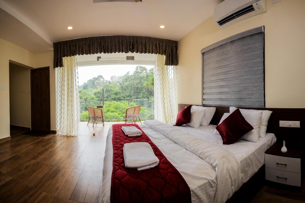 Thenmala Hormuz Inn Kolattupuzha Buitenkant foto