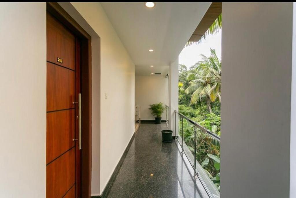 Thenmala Hormuz Inn Kolattupuzha Buitenkant foto