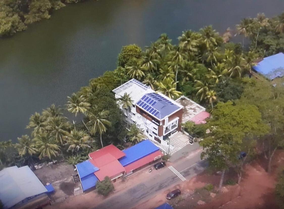 Thenmala Hormuz Inn Kolattupuzha Buitenkant foto